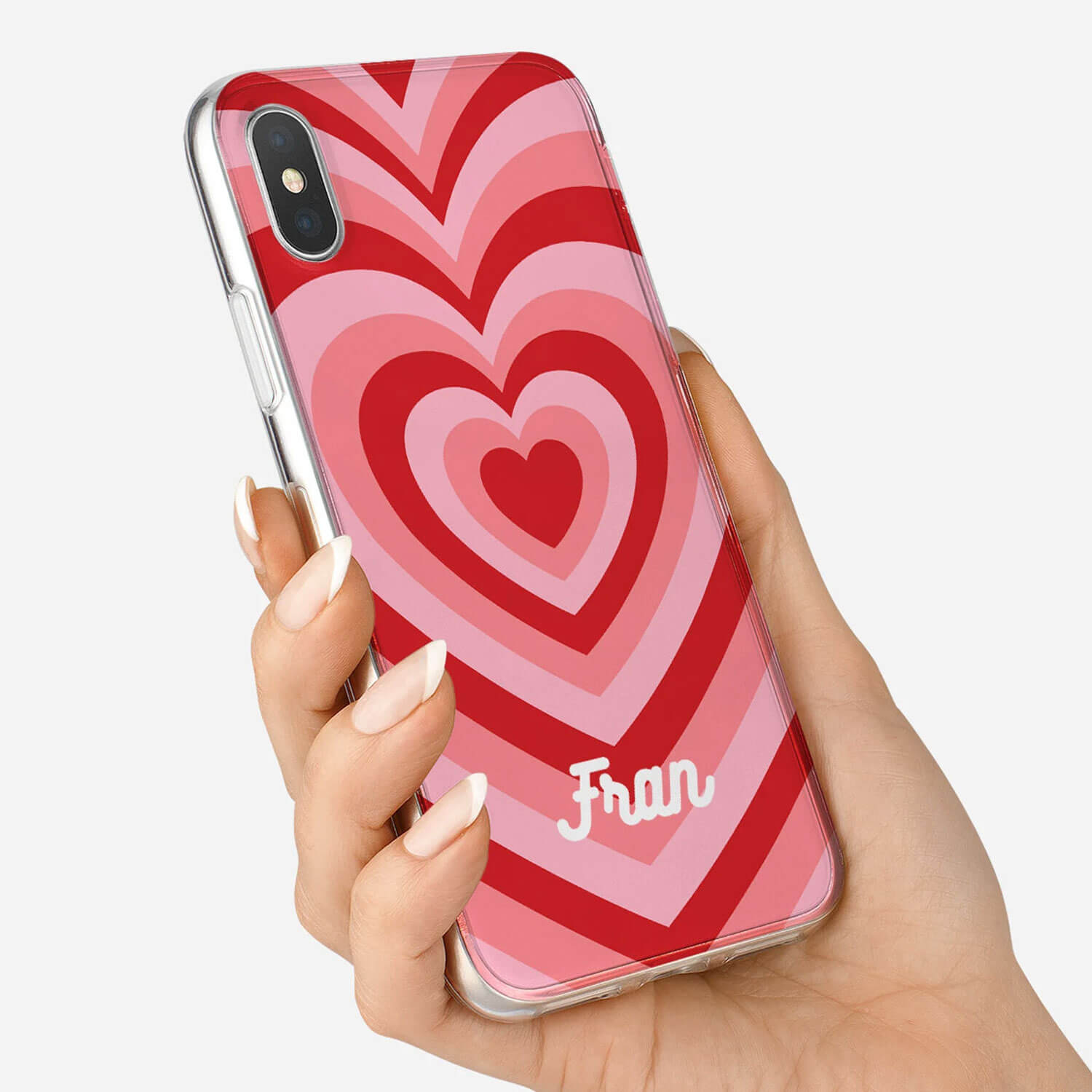 Wrappz phone case with a popular, retro pink and red heart design and a personalised name in white text.