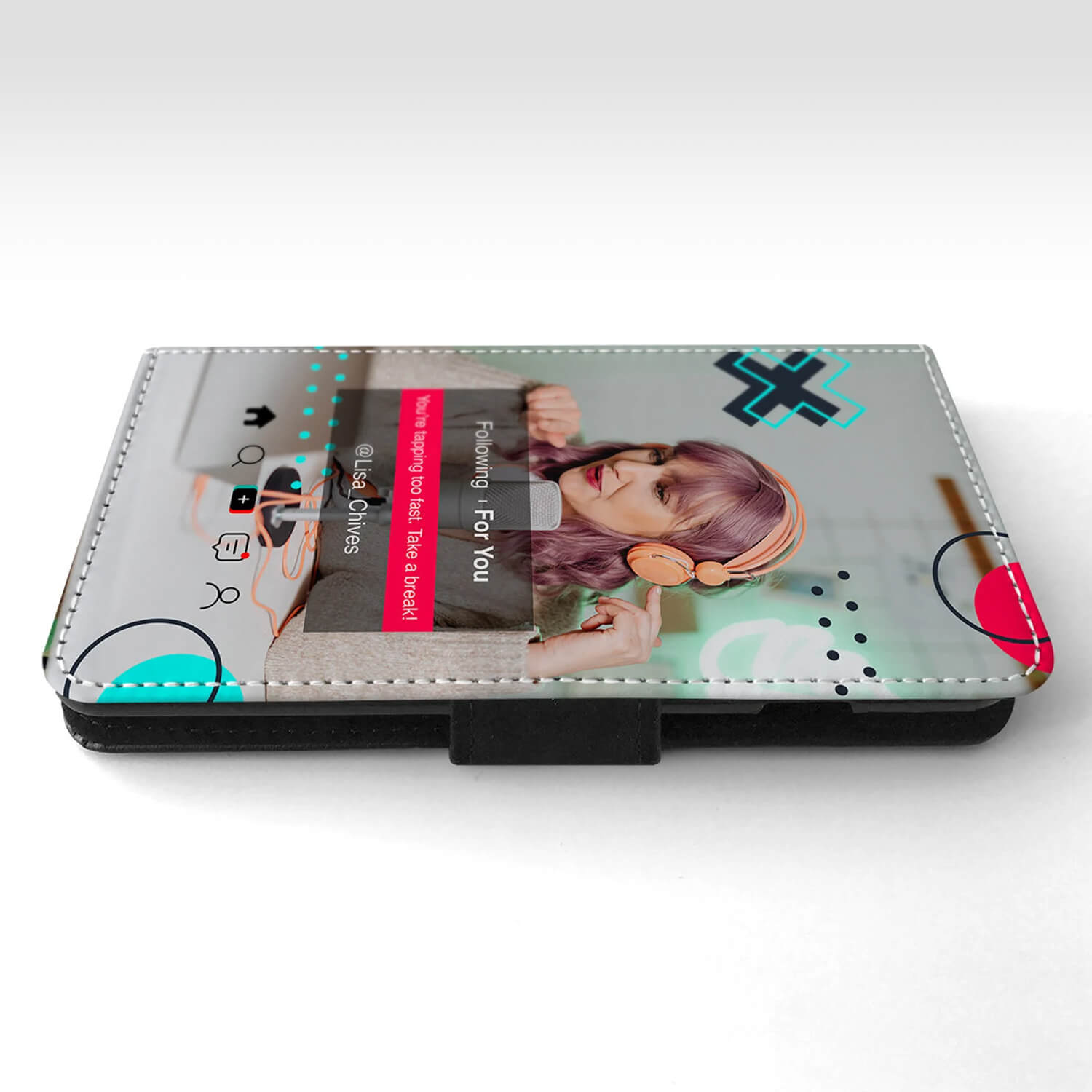 Wrappz phone case with personalised image of a woman smiling, bordered by neon shapes and features a pop-up style TikTok account details.